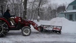 Tractor Plowing Snow with BIG Plow [upl. by Aniala]